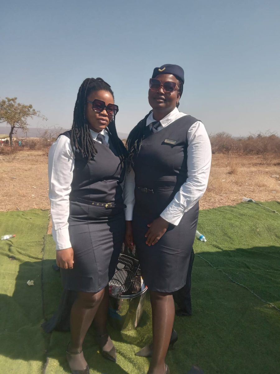Two Corbis Trading ushers in uniform